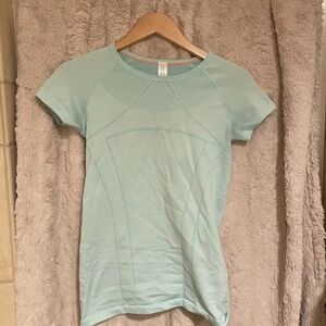 Light blue athletic top size 14